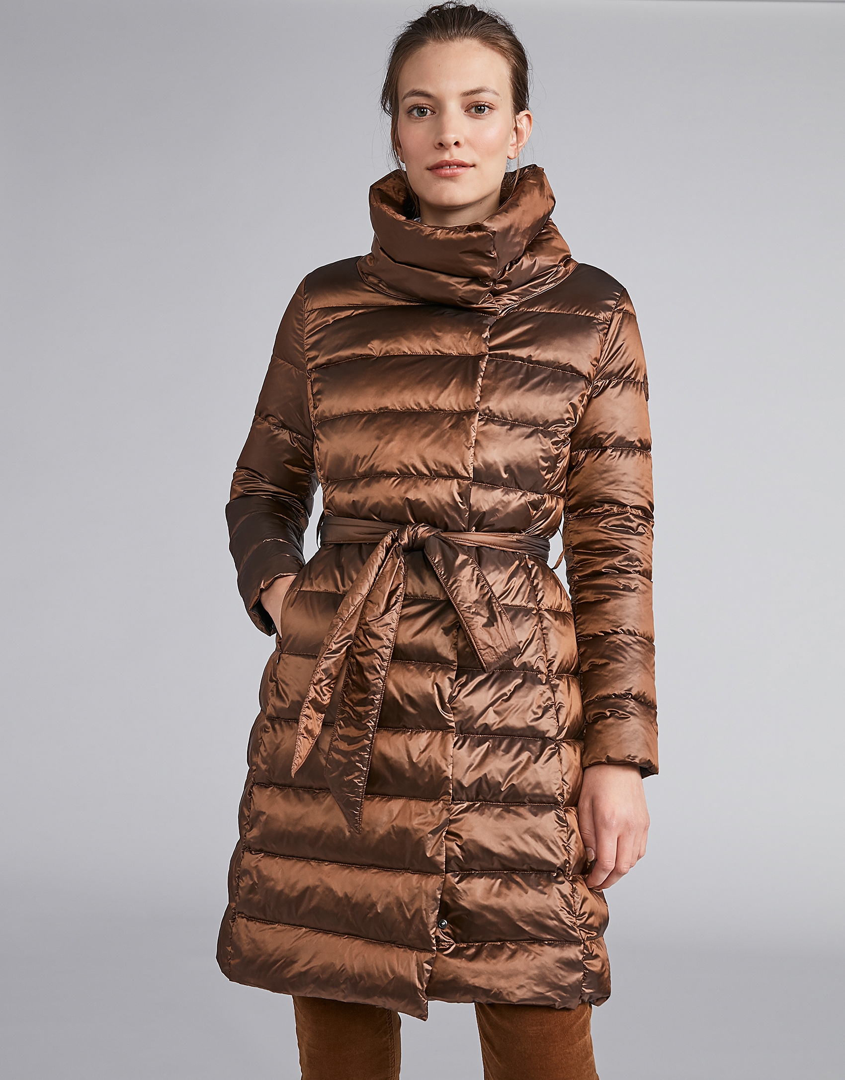 Coffee-colored long ski jacket with belt