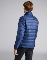 Blue tech ski jacket with details on zippers