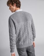 Gray sweater with cable-stitching