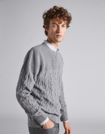 Gray sweater with cable-stitching