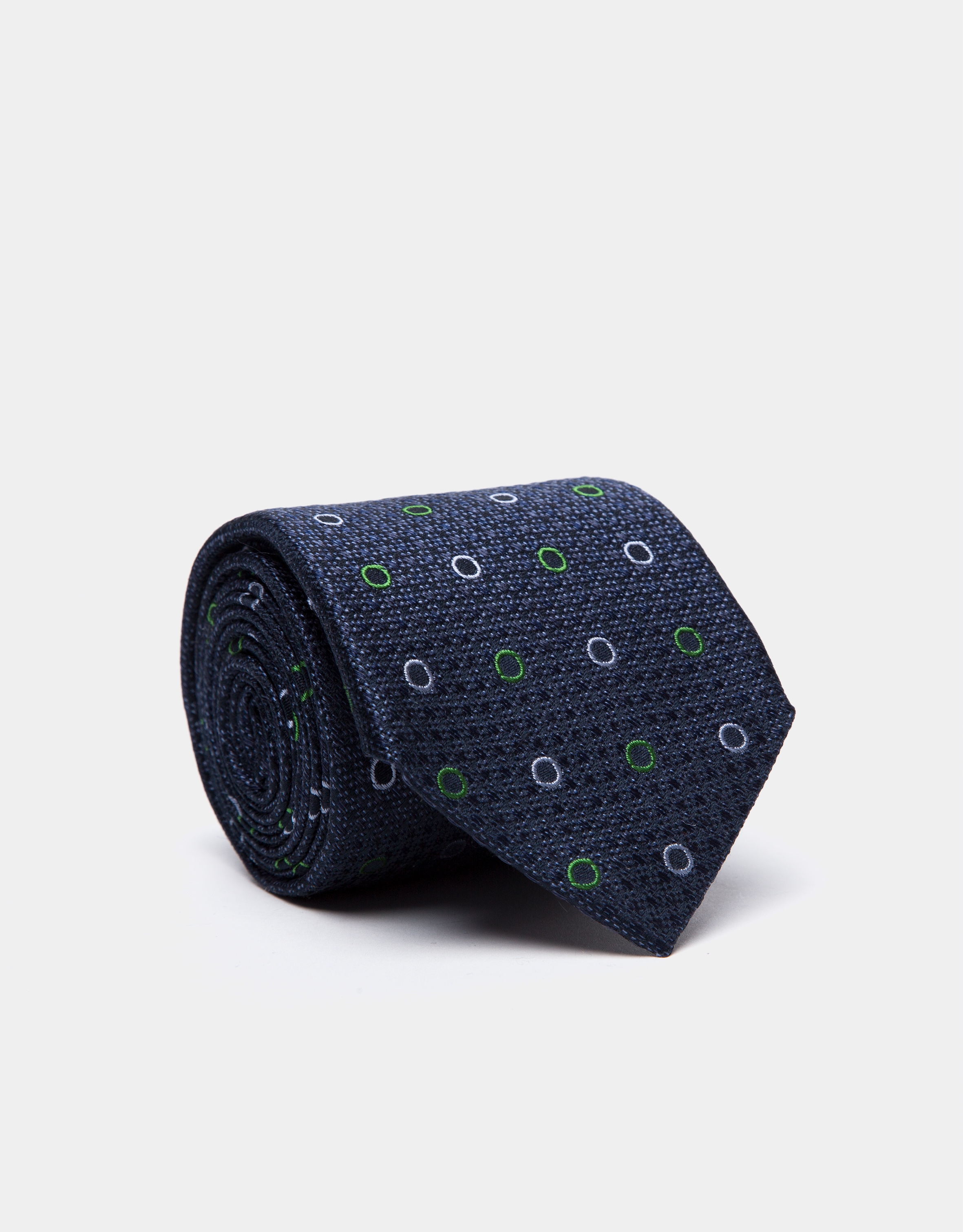 Blue wool tie with green/light blue circles