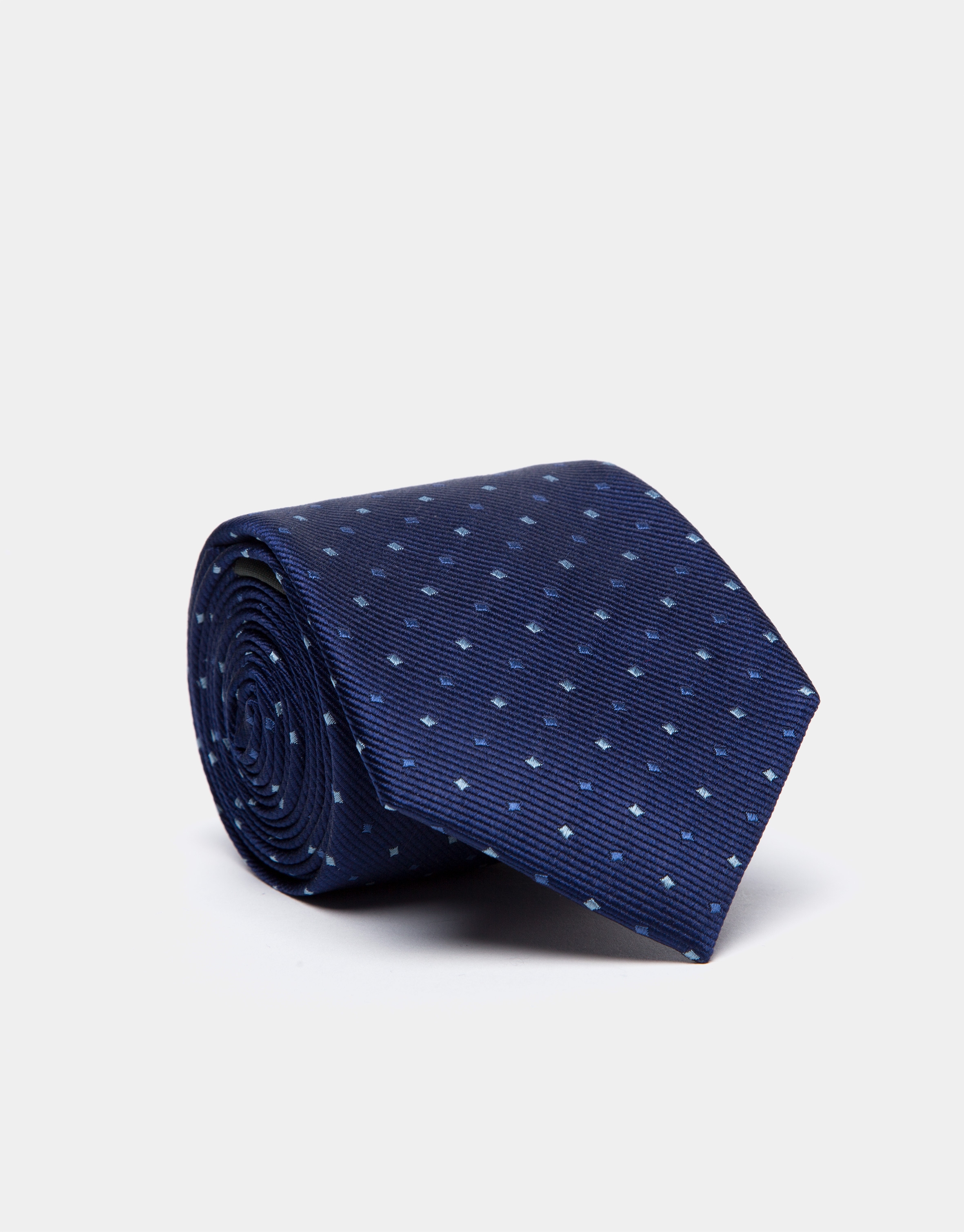 Corbata de seda azulón y jacquard geométrico en tonos azules