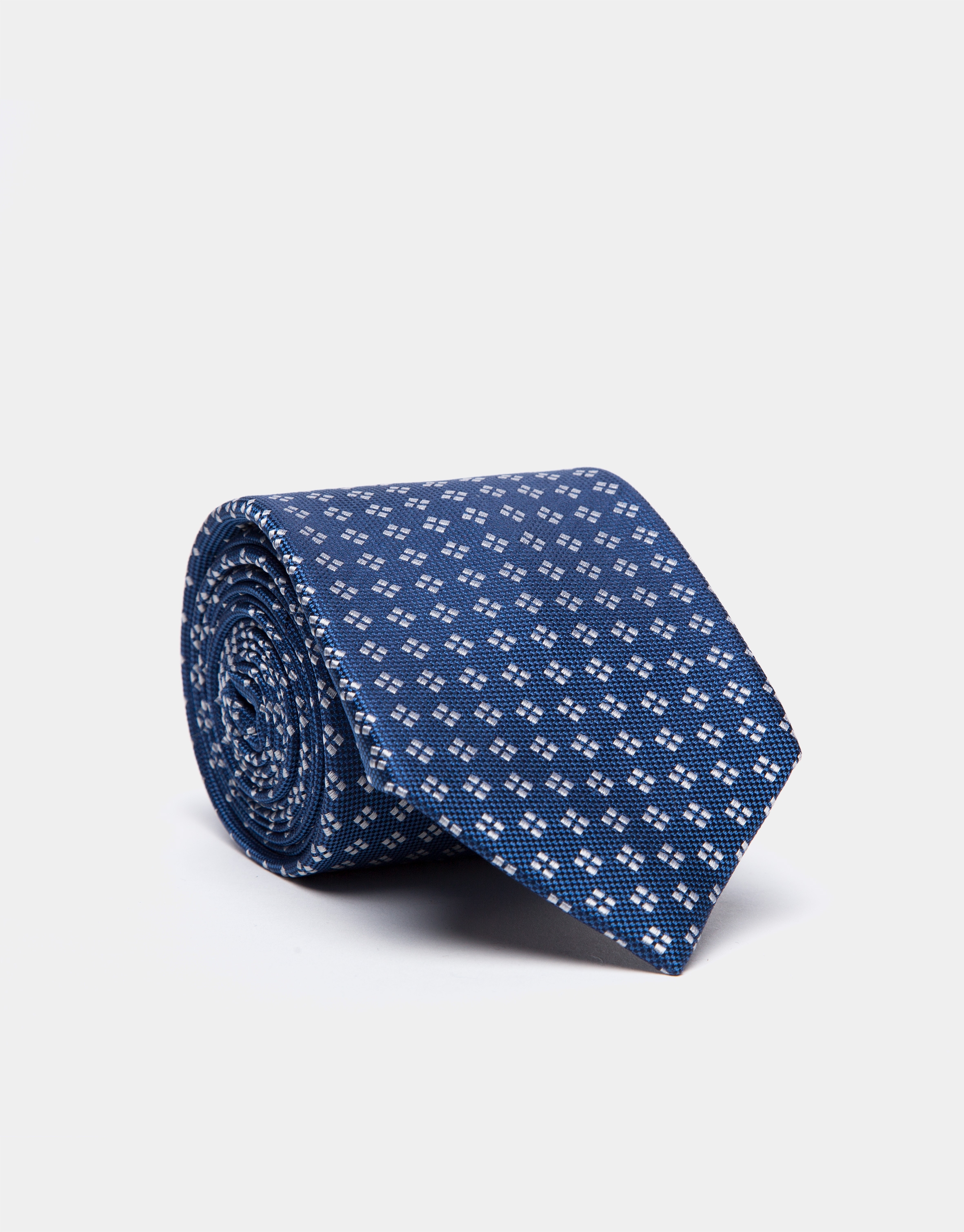 Blue silk tie with pearl gray jacquard geometric print