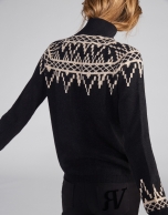 Black sweater with fretted print