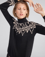 Black sweater with fretted print