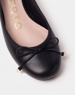 Black leather ballerinas