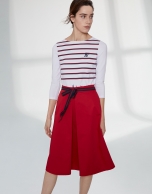 Poppy colored skirt with front fold