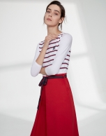 Poppy colored skirt with front fold