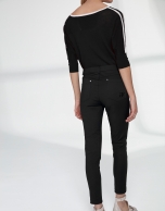 Black cigarette pants with irregular hem