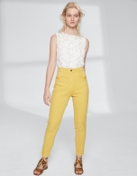 Yellow pants with fringe hem