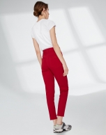 Crimson pants with fringe hem