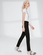 Black cigarette pants with embroidered pocket