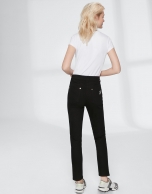 Black cigarette pants with embroidered pocket