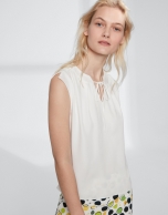 Off white top with folded neckline