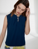 Navy blue top with folded neckline