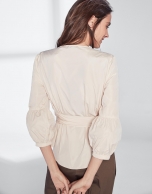 Sandy-colored top with gathered sleeves