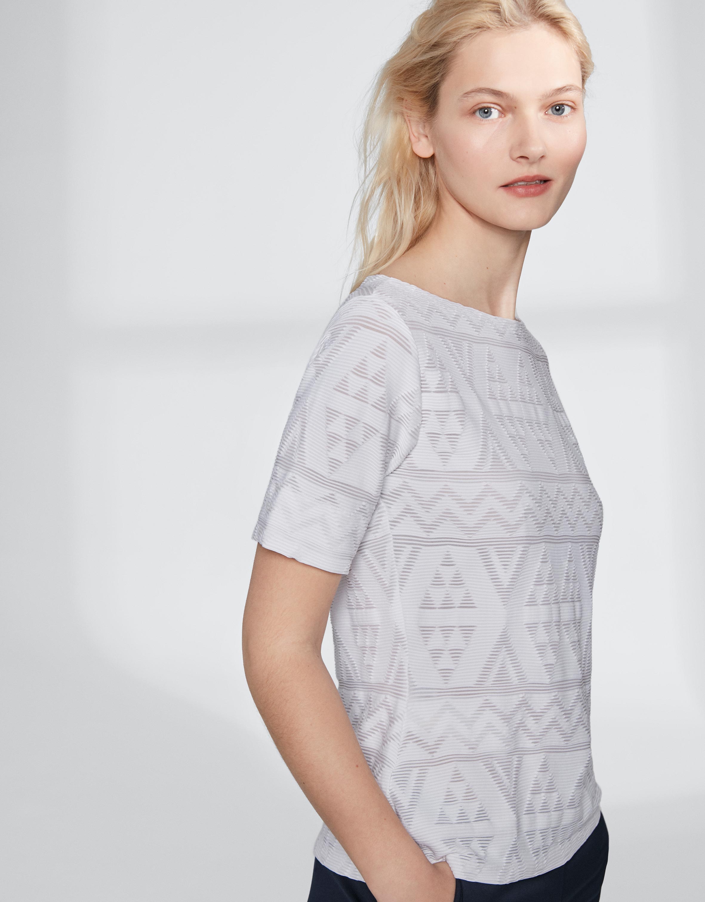 White top with an embossed fabric