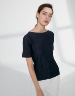 Navy blue top with an embossed fabric