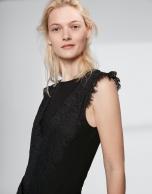 Black top with transparencies and lace