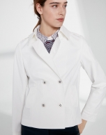 Ivory jacket with two rows of button