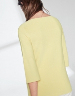 Yellow sweater with flounce