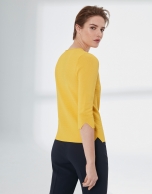 Yellow V-neck sweater