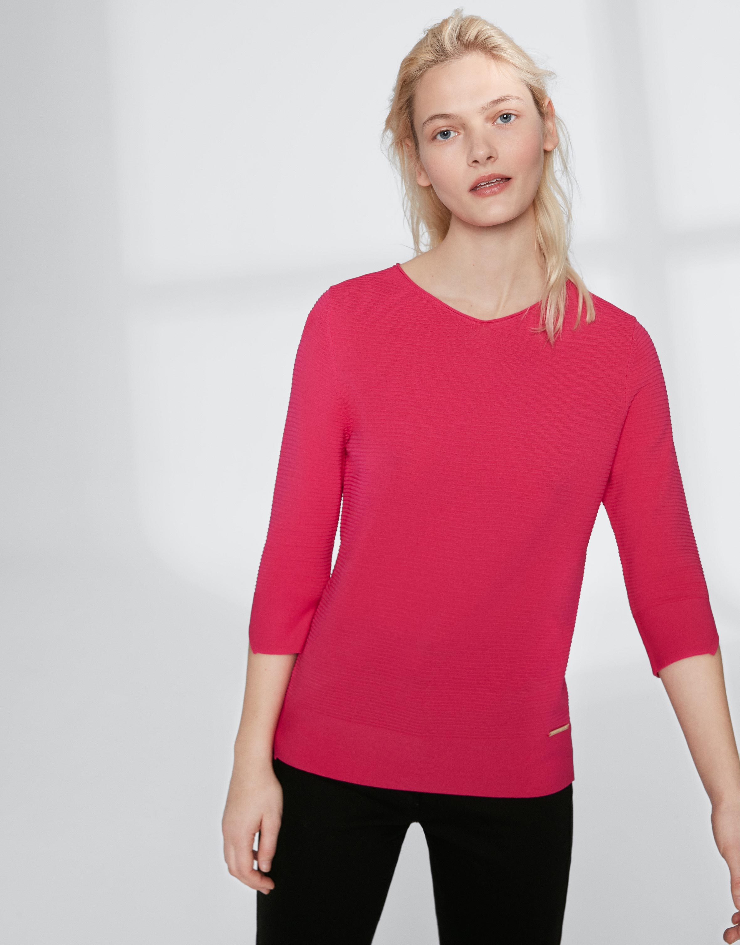 Pink V-neck sweater