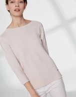 Sandy-colored sweater with round neckline