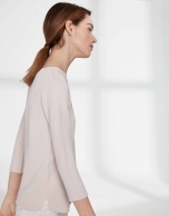 Sandy-colored sweater with round neckline