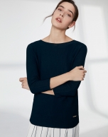 Navy blue sweater with round neckline