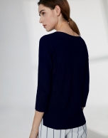 Navy blue sweater with round neckline