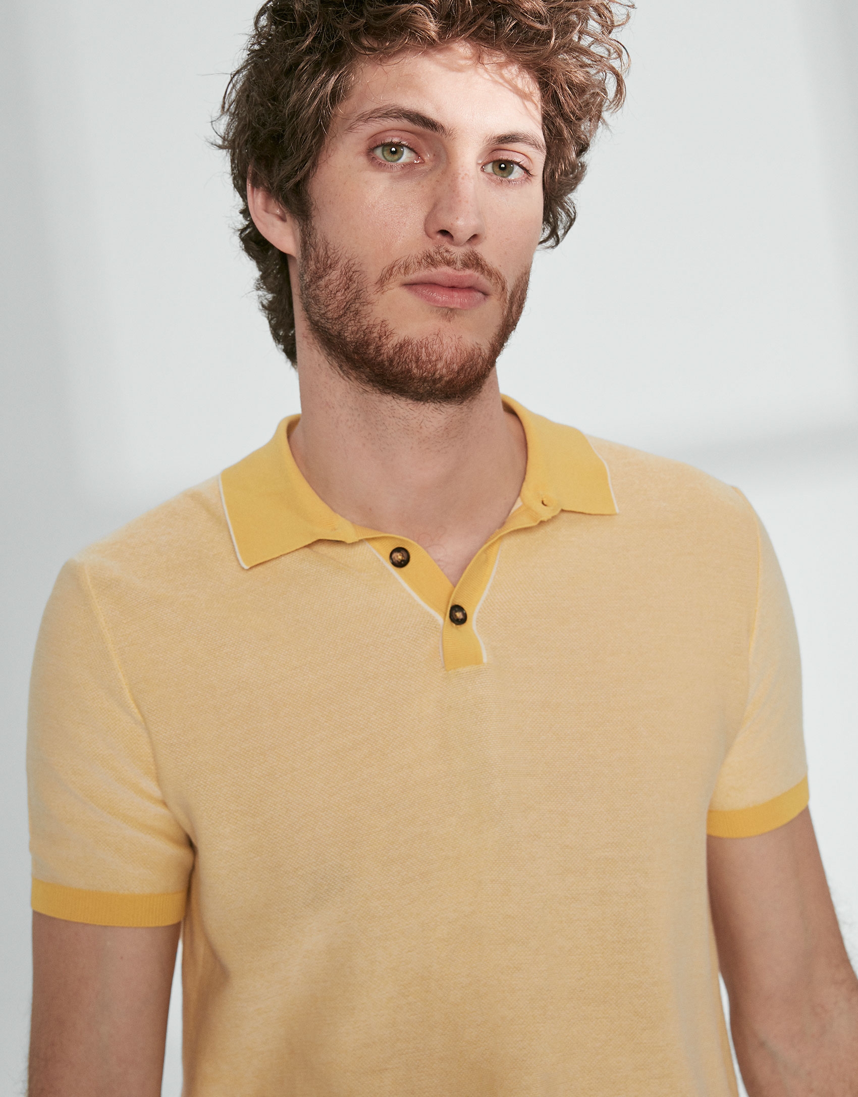 Yellow and white cotton polo