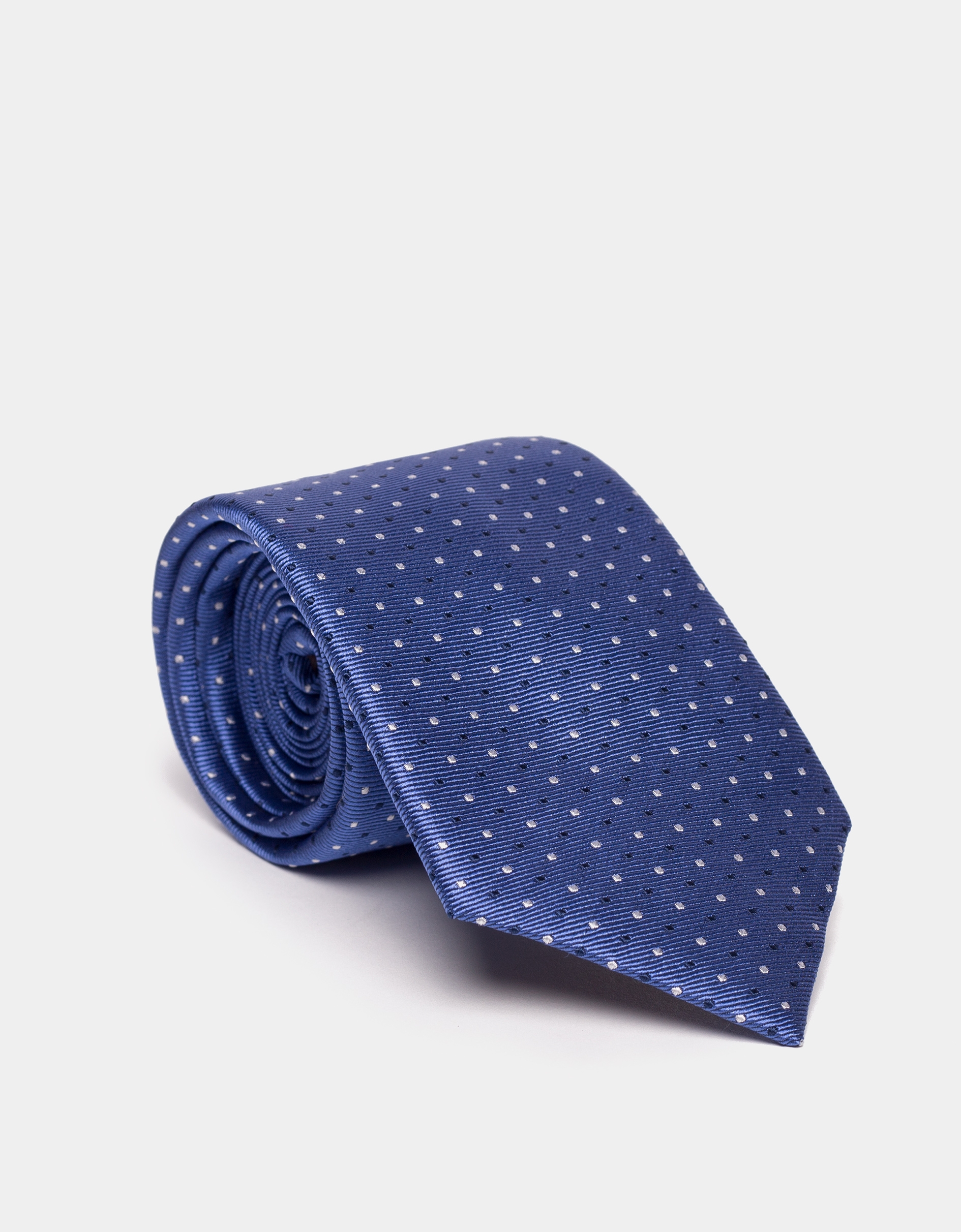 Blue silk jacquard tie with dots. 