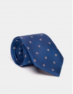 Blue jacquard silk tie with orange dots