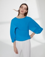 Blue top with superimposed cape