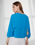 Blue top with superimposed cape