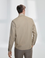 Sandy-colored windbreaker with pockets