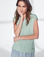 Green pastel top with V-neck