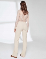 Sandy-colored pants suit