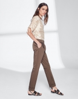 Khaki green pants with turned-up hem