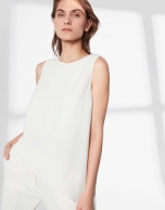 White top with asymmetric hem