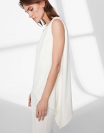 White top with asymmetric hem