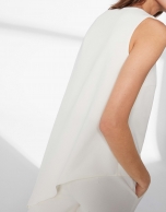 White top with asymmetric hem