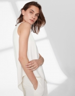 White top with asymmetric hem