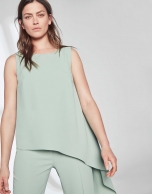 Pastel green top with asymmetric hem