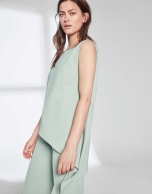 Pastel green top with asymmetric hem