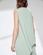 Pastel green top with asymmetric hem