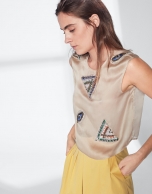 Beige silk top with appliqué