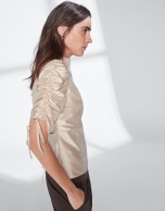 Beige silk blouse with puckered sleeves