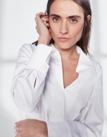 White shirt with bow at waist